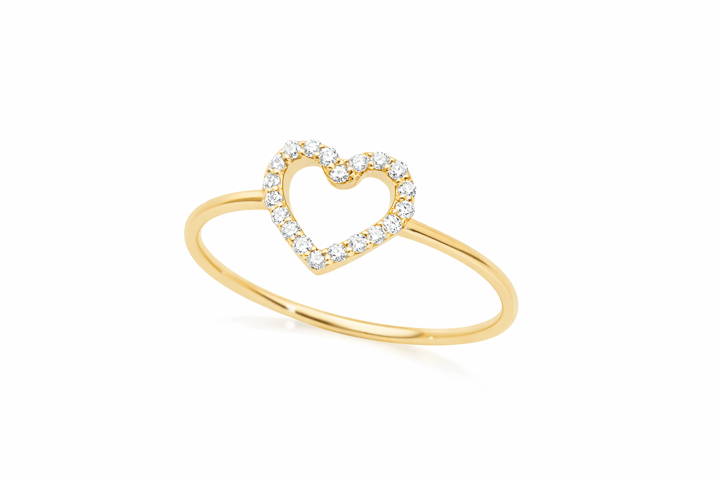 Gold ring with a heart-shaped diamond design on a white background