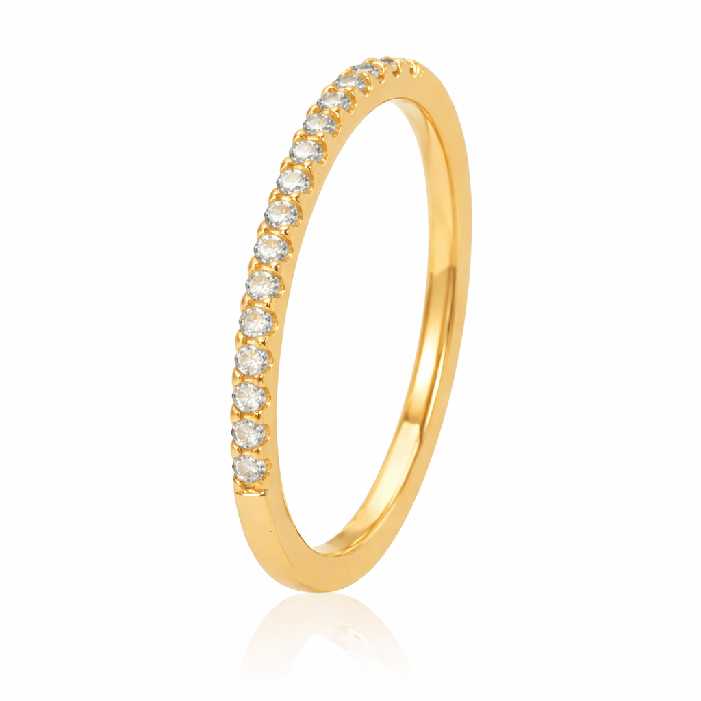 Gold ring with small diamonds on a white background