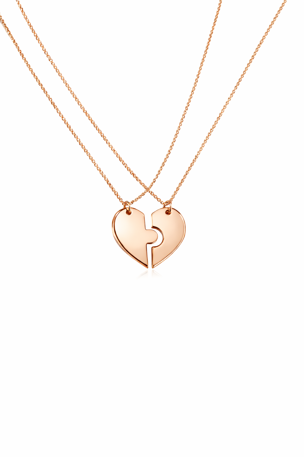 Rose gold heart-shaped necklace with a split design on a white background