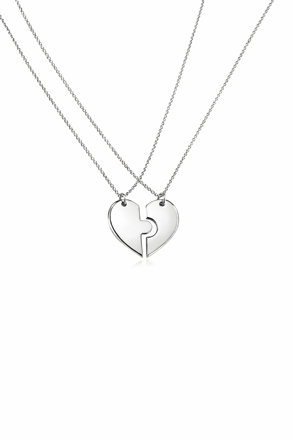Two interlocking heart-shaped pendants on a white background