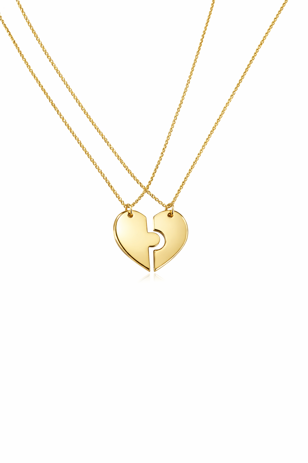 Gold heart-shaped necklace with a split design on a white background