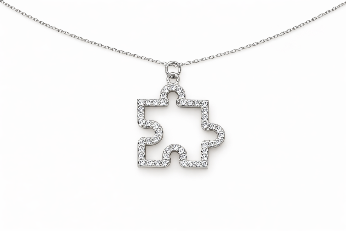 White gold necklace with a star-shaped pendant on a white background