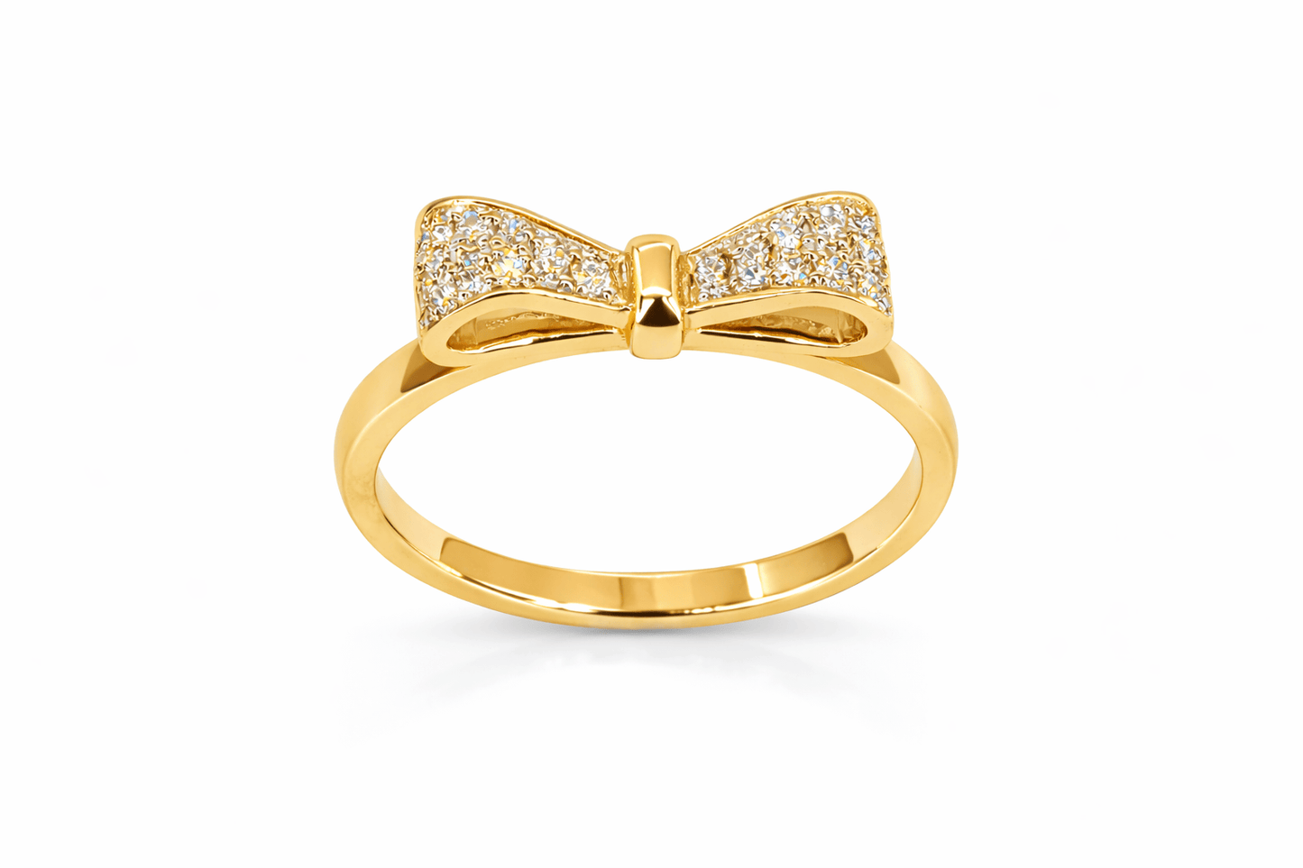 Gold bow-shaped ring with diamond accents on a white background