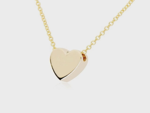 video of yellow gold heart pendant