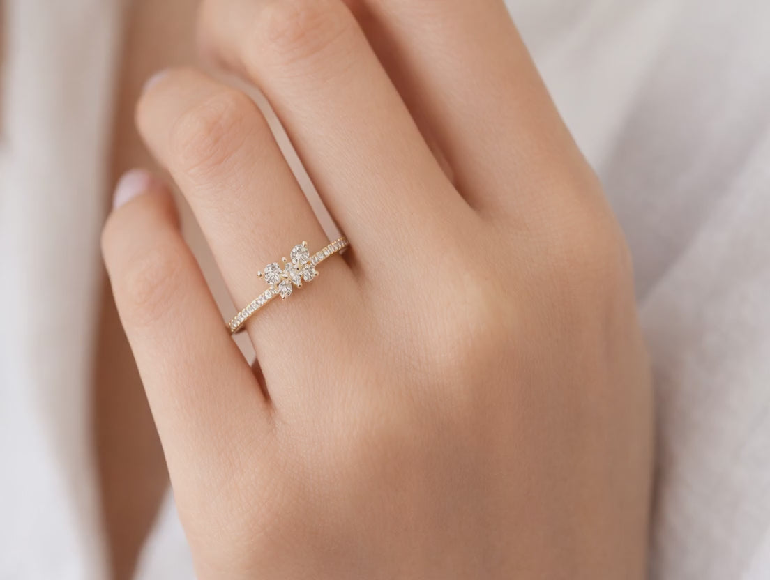 hand model wearing 14k Gold Butterfly Diamond Ring