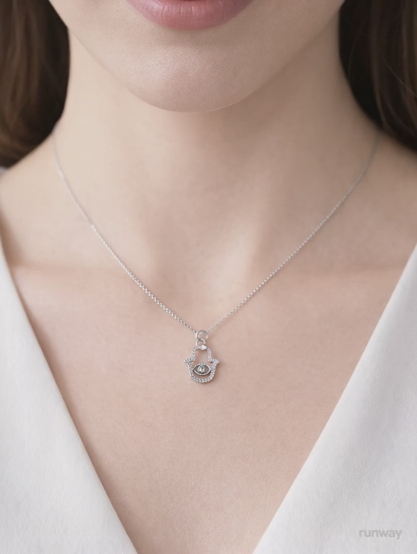 video of diampond hamsa necklace